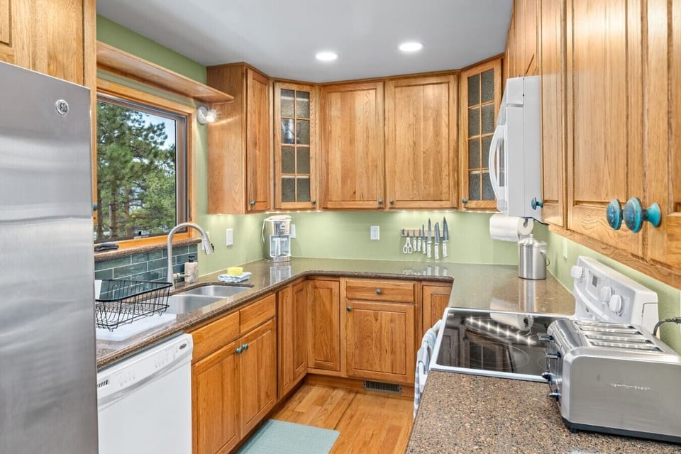 Our kitchen has fridge/freezer with ice maker, dishwasher, oven/stove, microwave and everything you need to cook