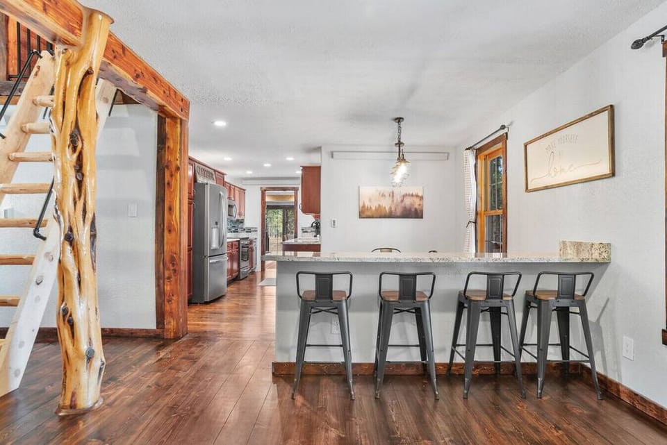 Another view of the generous dining space, offering plenty of room for everyone to gather together.