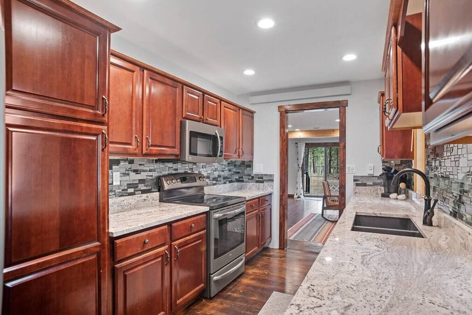 Discover the heart of the home — a spacious, open-concept kitchen and dining area that brings everyone together