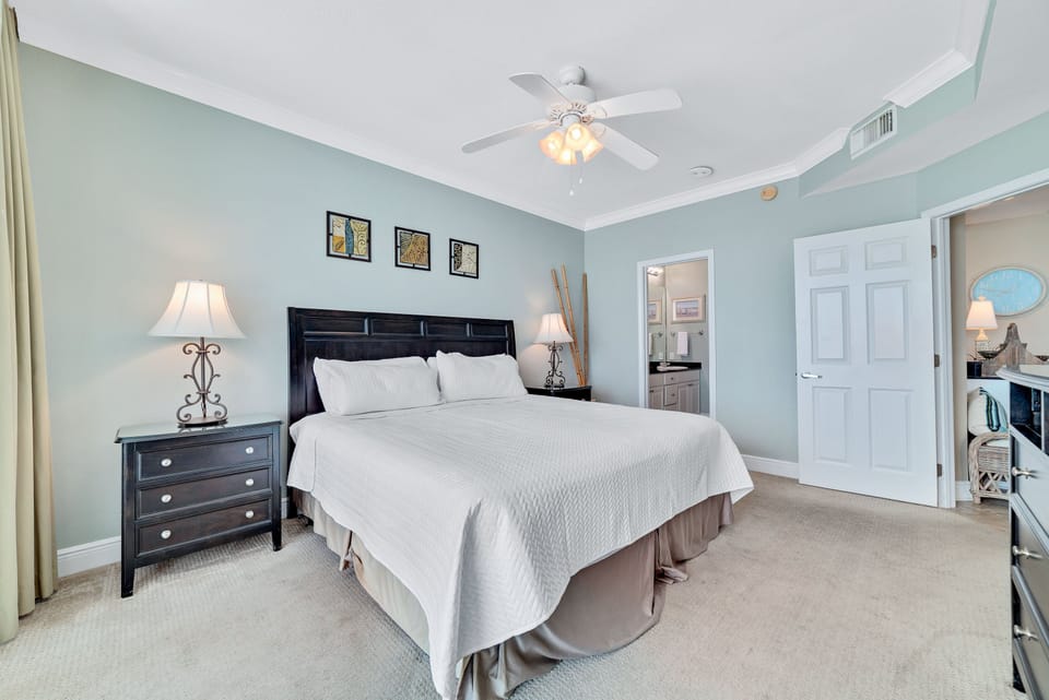 Master bedroom with a king bed