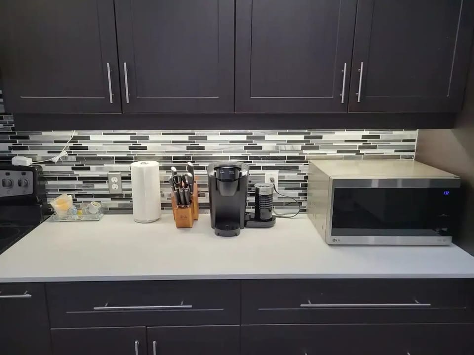 Fully equipped kitchen with complete set of cookware