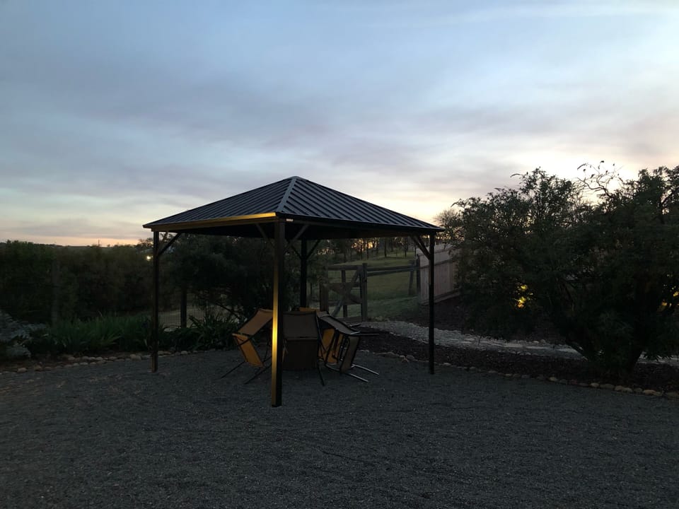 Seating area to the right of the firepit.