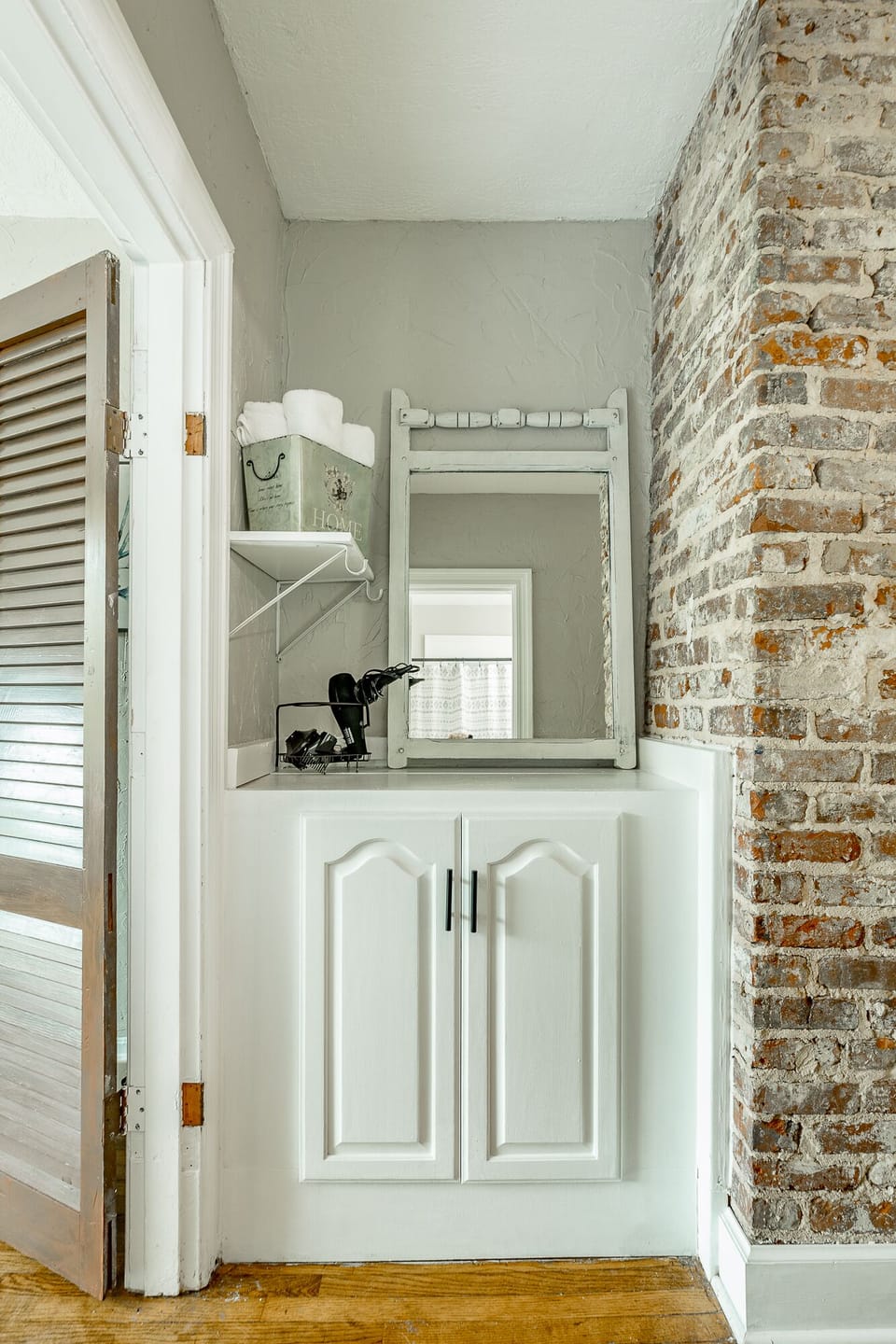 Vanity space adjacent to the bathroom, perfect for getting ready -blow dryer pro