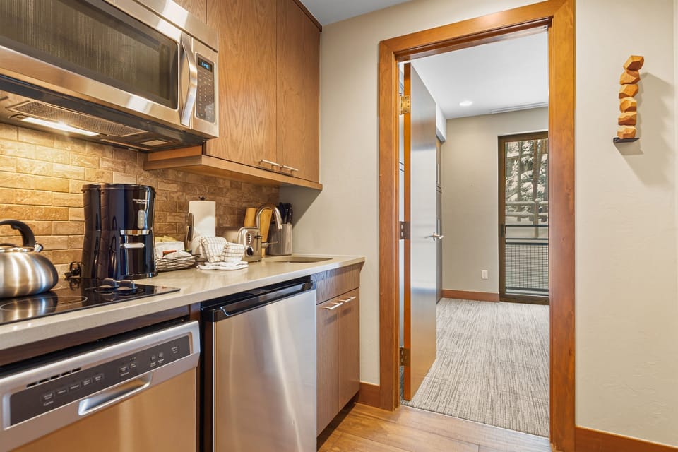 Stylish kitchenette with everything needed for a comfortable stay.