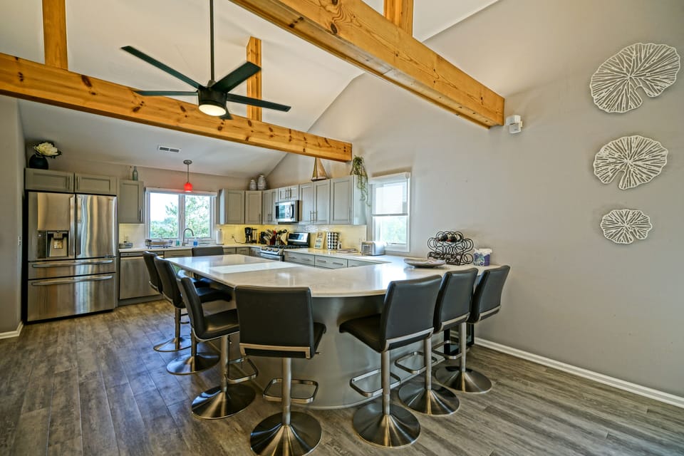 Large kitchen counter with seating for 8.