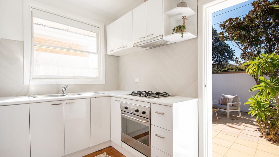 Kitchen leads out to a sunny courtyard