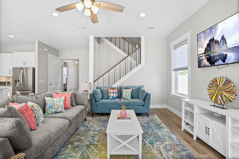 Get cozy in the large living room, where you can hang out, watch TV, or read your favorite book curled up on the couch or watch a movie together.