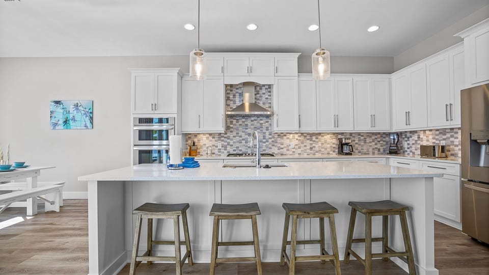 Once you're finished cooking dinner, enjoy your meal seated at our kitchen island (4).