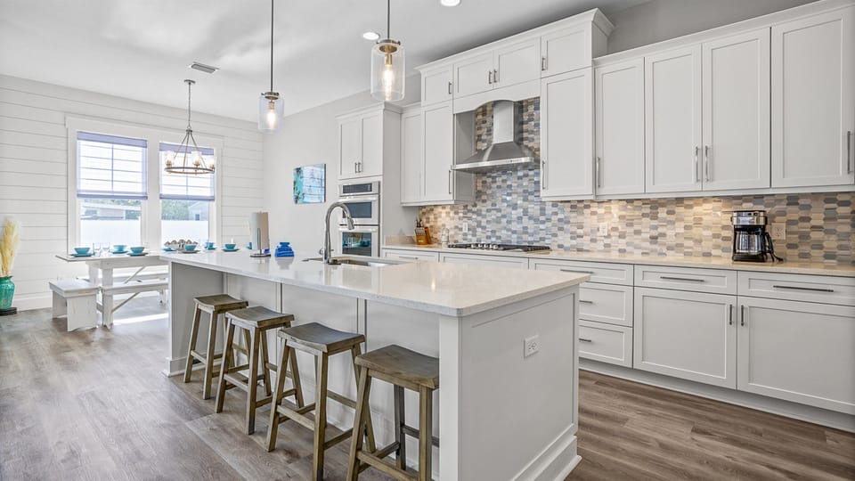 On your right, you'll find a fully-equipped chef's kitchen where you can cook in.