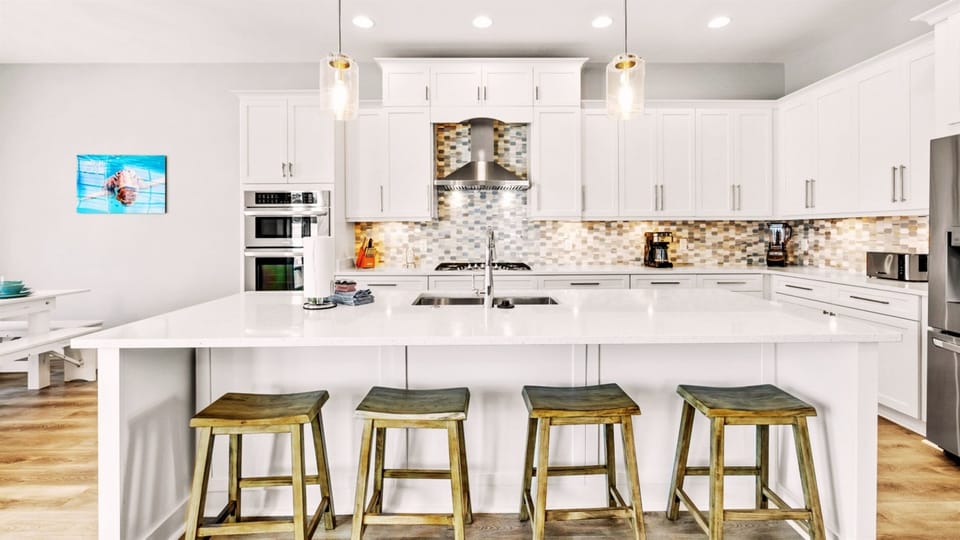 Once you're done cooking dinner, enjoy your meal at our kitchen island (seats 4).