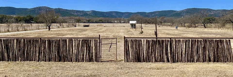 Away at the River - The large yard leads to the fields that are all fenced with spectacular views.