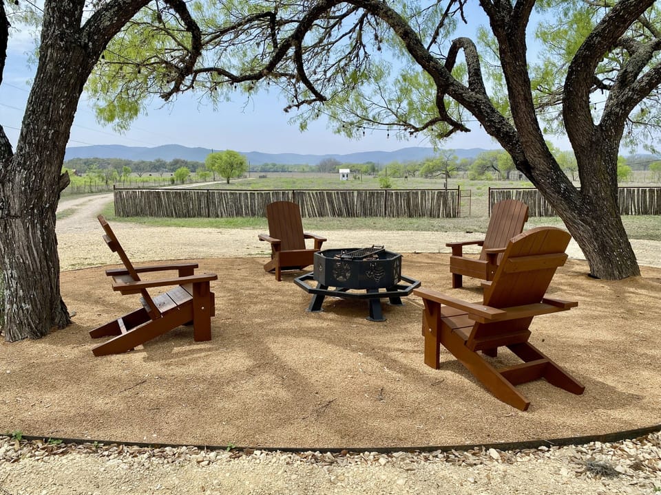 AWAY AT THE RIVER - Look at those mountain range views!
Stunning fire pit views for night time s'mores or a drink in hand to just talking about life.