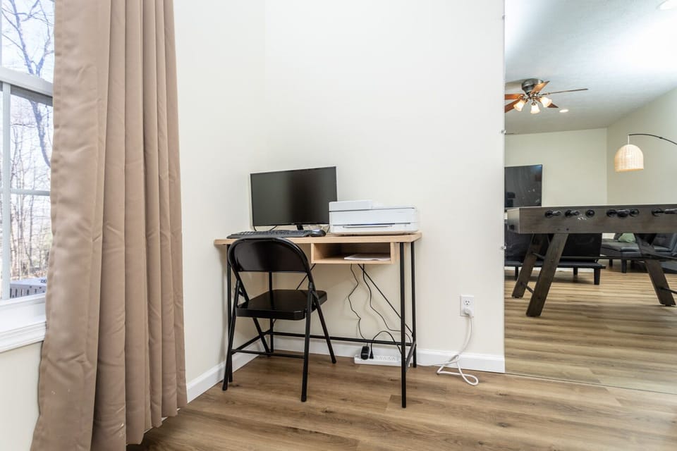 Dedicated work space including HDMI screen, mouse and keyboard, color printer 