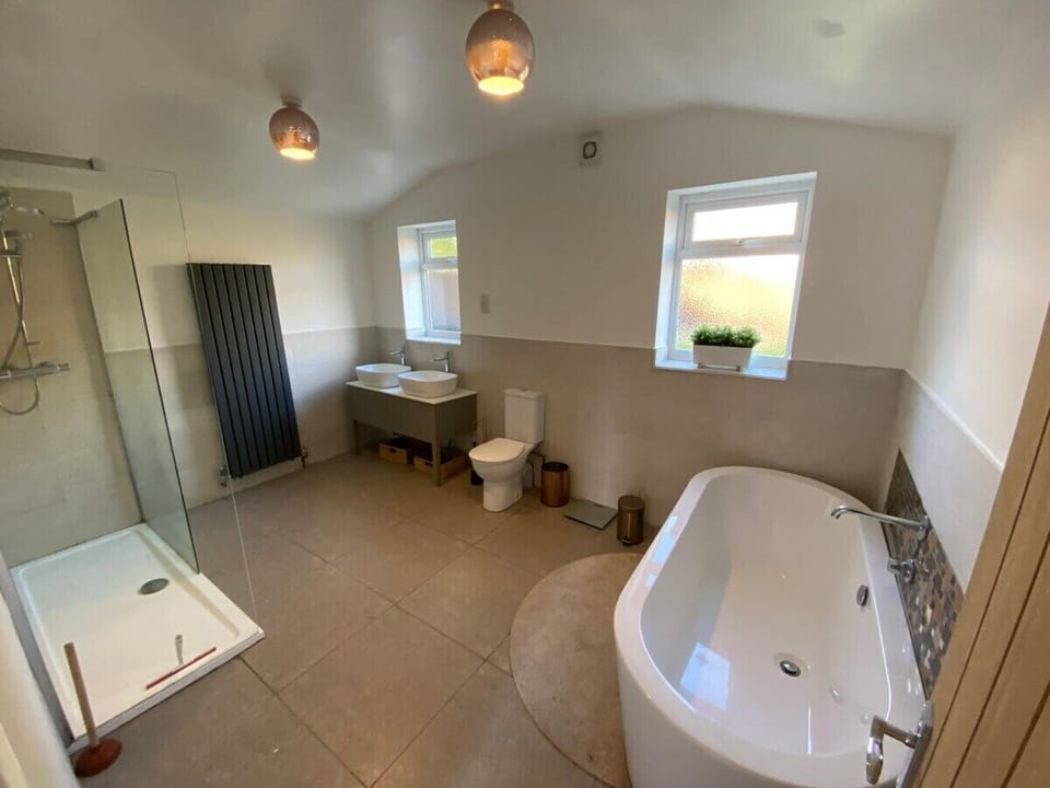 Large Bathroom with bestiful freestanding bath