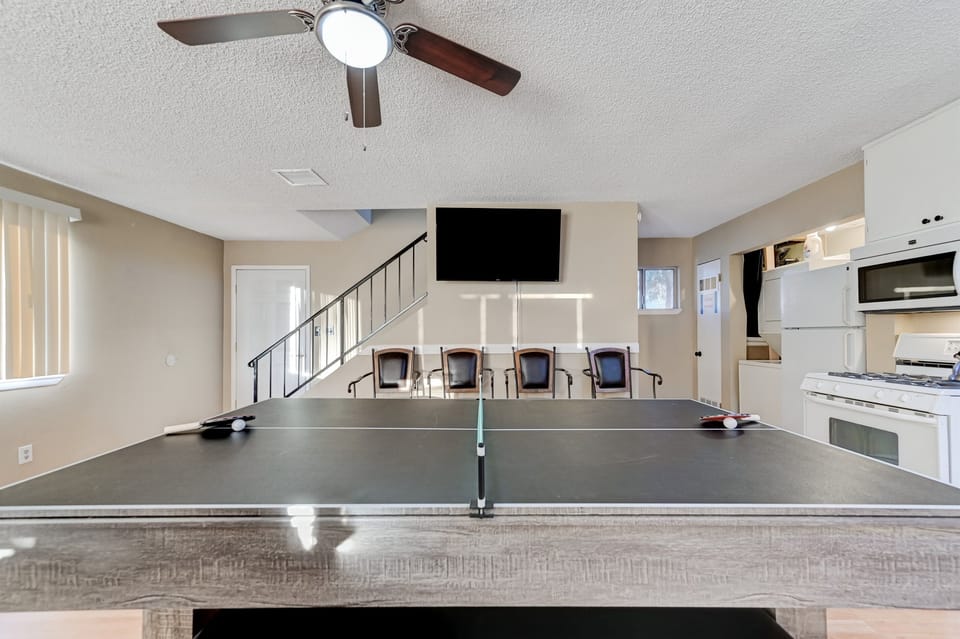 Ping pong table and 86 inch tv
