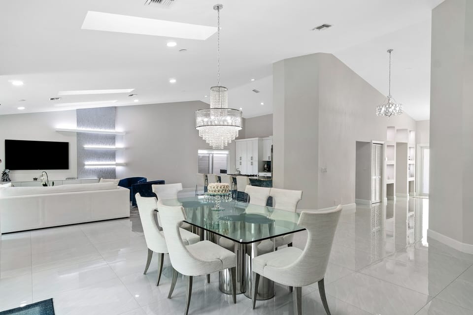 Stunning Dining Room with exquisite furnishings. Seating for 6 at Dining Table and 4 at the counter Bar =Seats 10