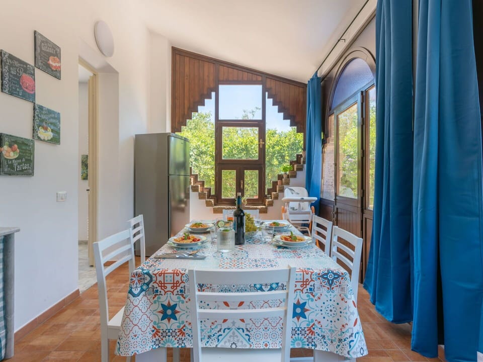 Plant, Furniture, Property, Window, Chair, Building, Wood, Lighting, Flowerpot, Architecture