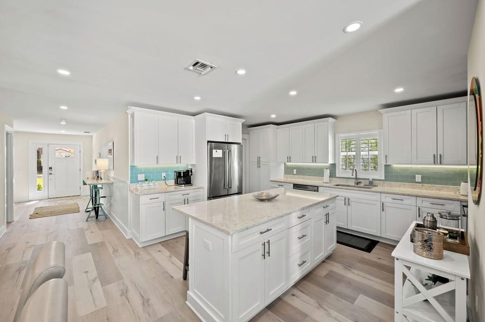 Bright sunny kitchen with keurig duo coffee bar, plenty of cooking amenities.