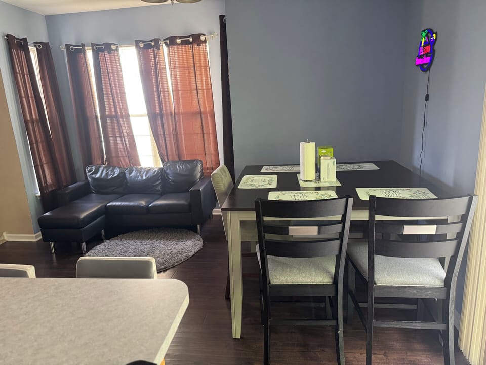 Kitchen area, Dining room table breakfast counter as well as small couch area