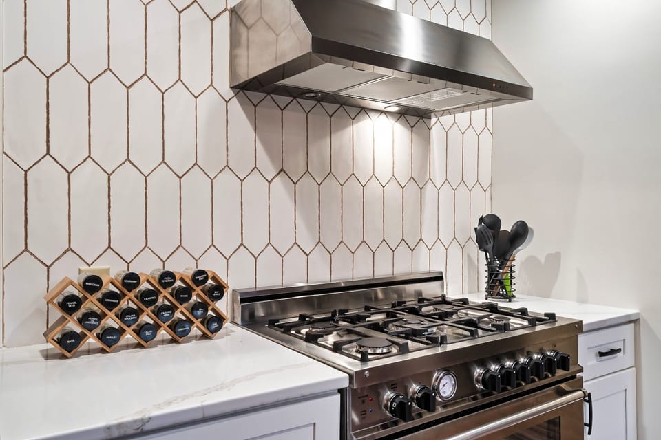 No limit to what you can prepare on this 5-burner Italian-made gas range.