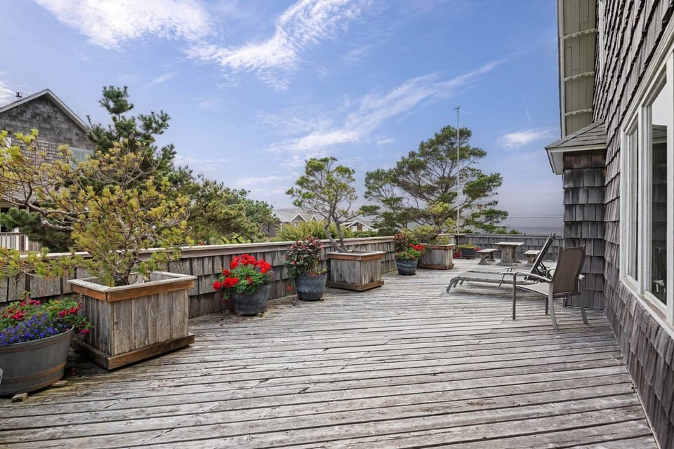 Guests can relax on the large deck while listening to the waves.