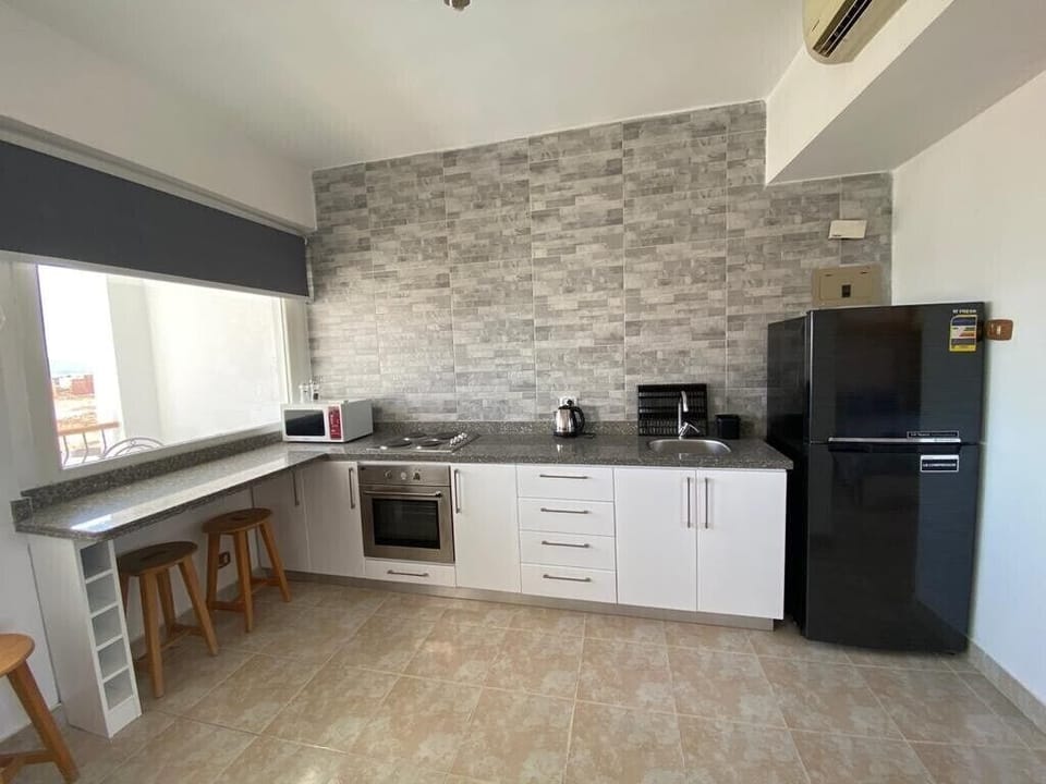 View of kitchen and breakfast bar