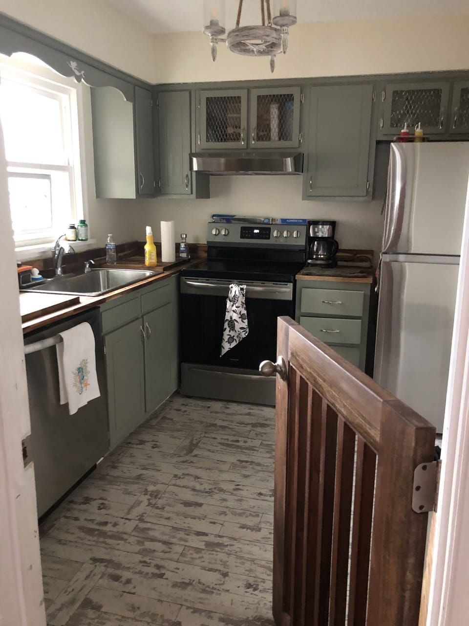 Kitchen with half gate.  