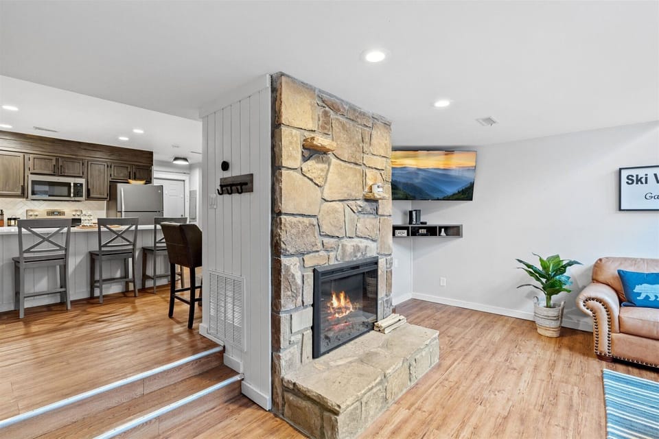 Cozy up by the electric fireplace with color changing LED lights