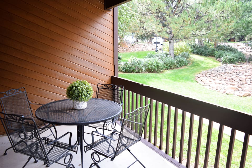 Patio with dining table and chairs.