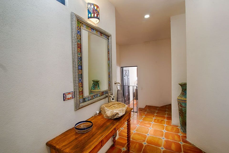 main level bathroom leading to the front room