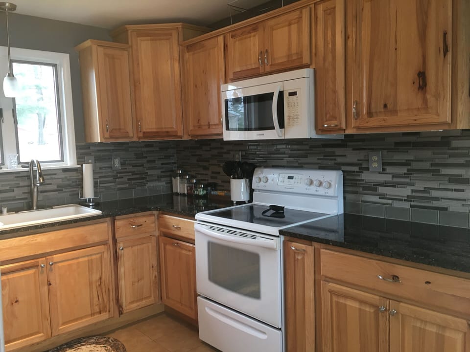 Kitchen (stove/oven, microwave, toaster, coffee maker, waffle iron, mixer, etc).
