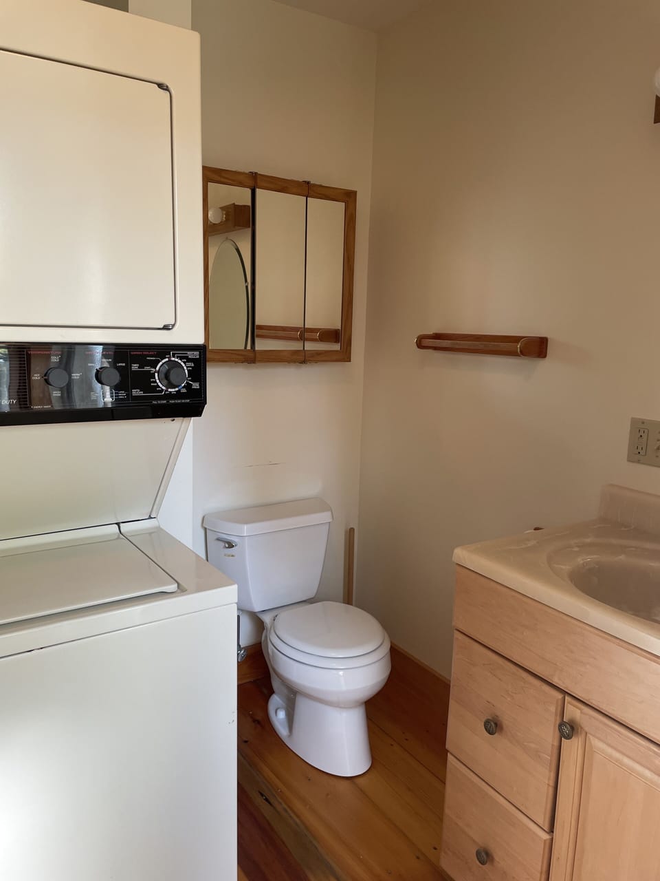 Downstairs full bathroom with washer and dryer