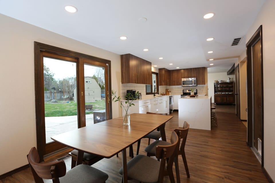 Dining table and kitchen. 