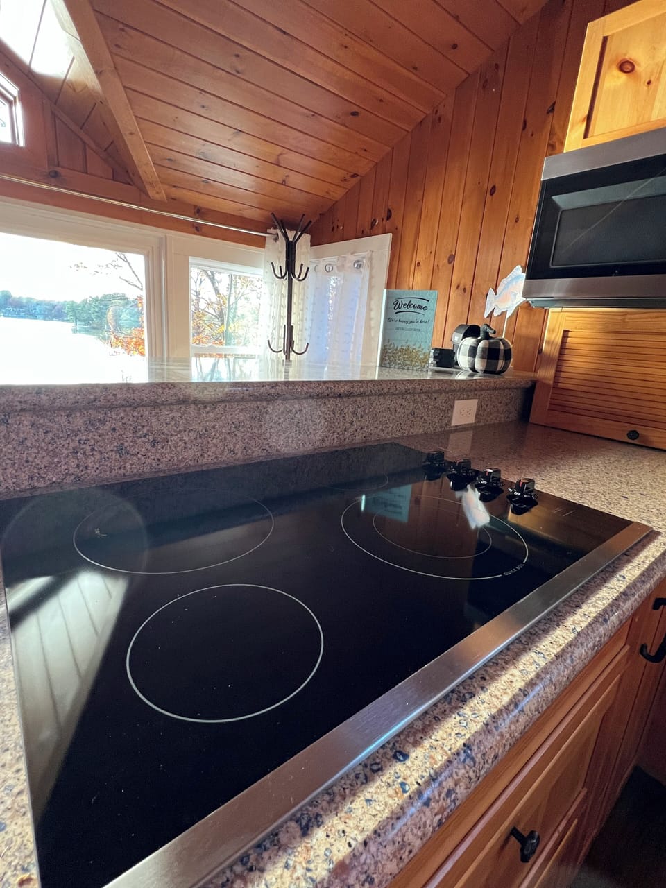 Kitchen with microwave, electric cooktop, dishwasher, double oven, refrigerator