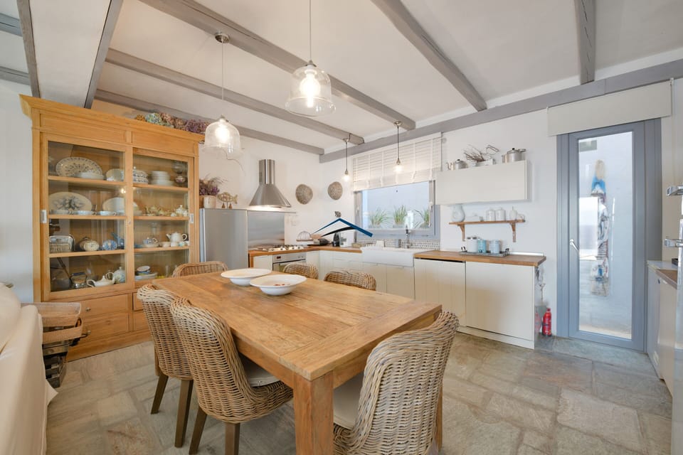 The dining area and fully equipped kitchen