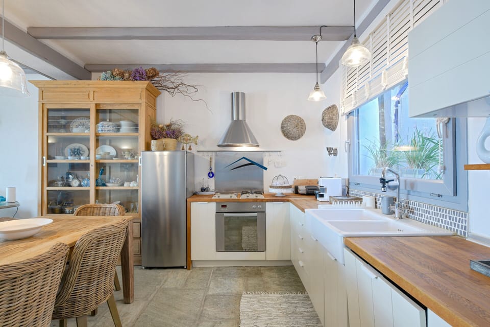 The dining area and fully equipped kitchen