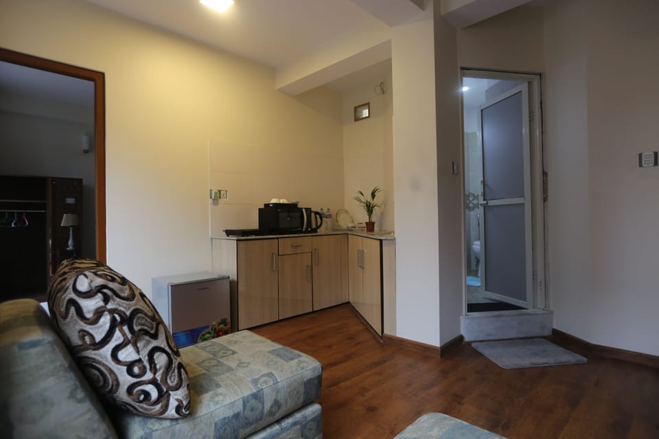 Sitting Area / Kitchen / Toilet 
