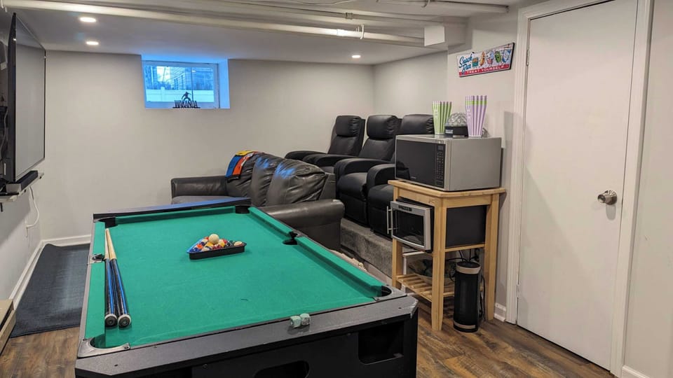 Bonus Room: Game Room & Home Theater! Enjoy a game room with a pool table, darts, basketball arcade game, and foosball table. Relax in the home theater with a queen pullout couch and 4 leather stadium seats with massage features. Additional fee applies.