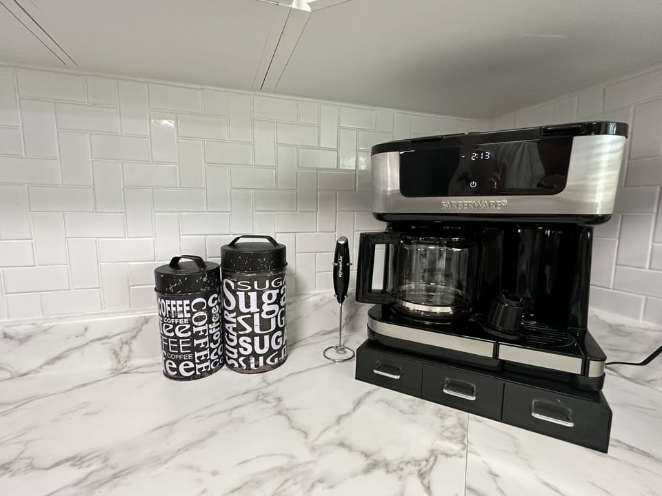 Ground and pods coffee maker! Complimentary coffee included.