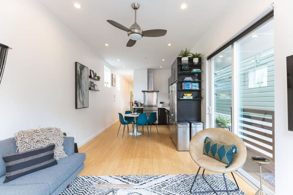 Open concept floor plan featuring Living Room, Kitchen, and Dining Area
