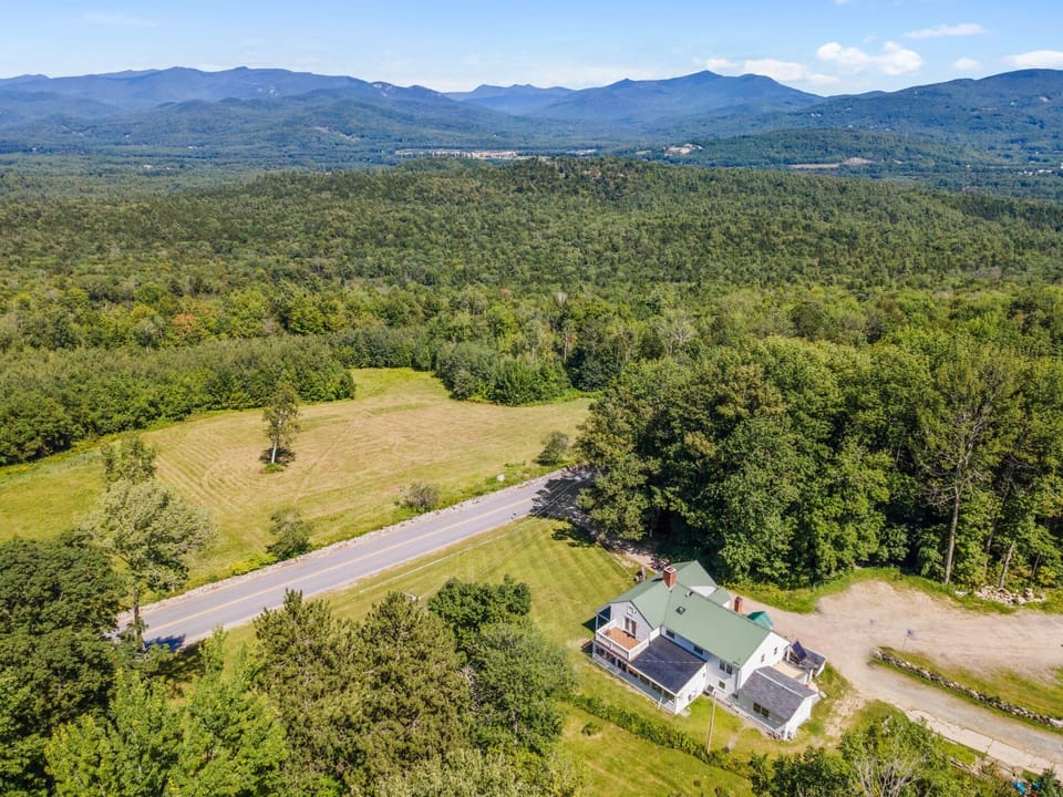 Drone photo showing the house in its gorgeous setting