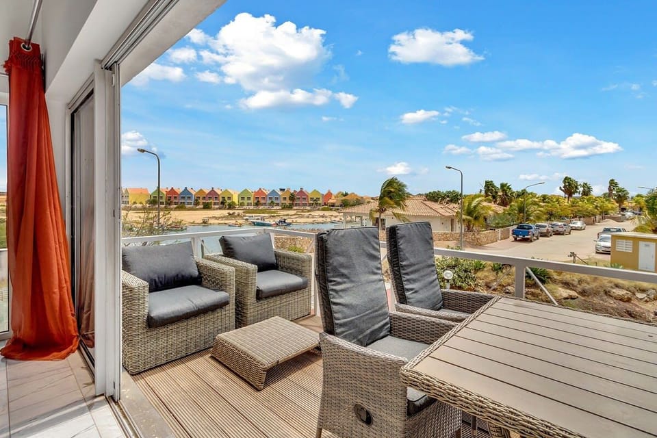 Caribbean Court Apartment Djodjo with a refreshing shared pool and spectacular marina views Apartment in Netherlands