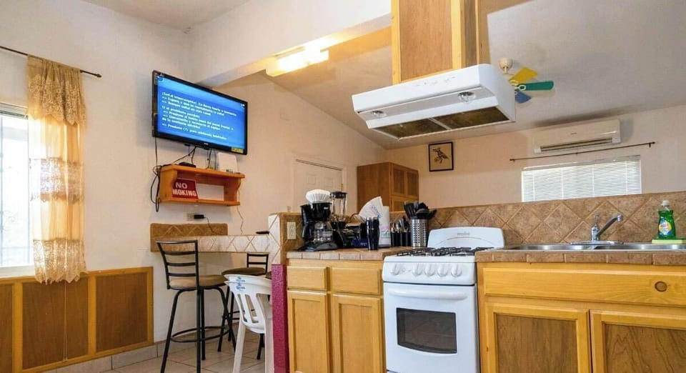 Full kitchen at Casa Sirena in San Felipe BC MX — includes oven, microwave, refrigerator, and tea/coffee maker .