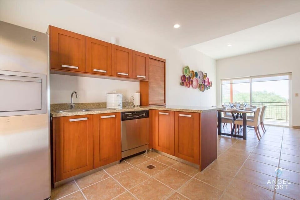 Kitchen setup with a dishwasher for added convenience.