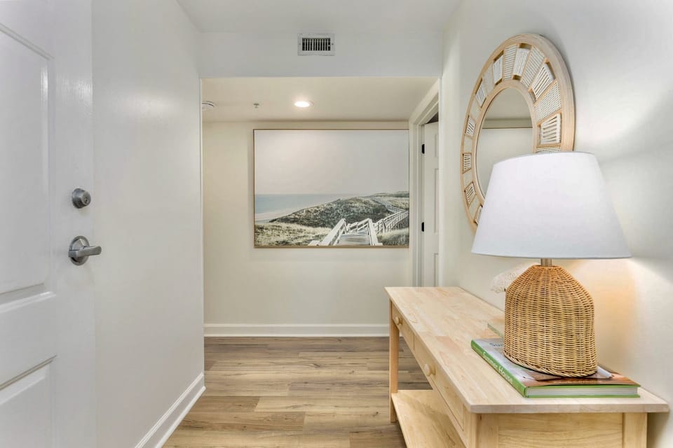 Stylish coastal entryway sets the tone for your beachfront escape.