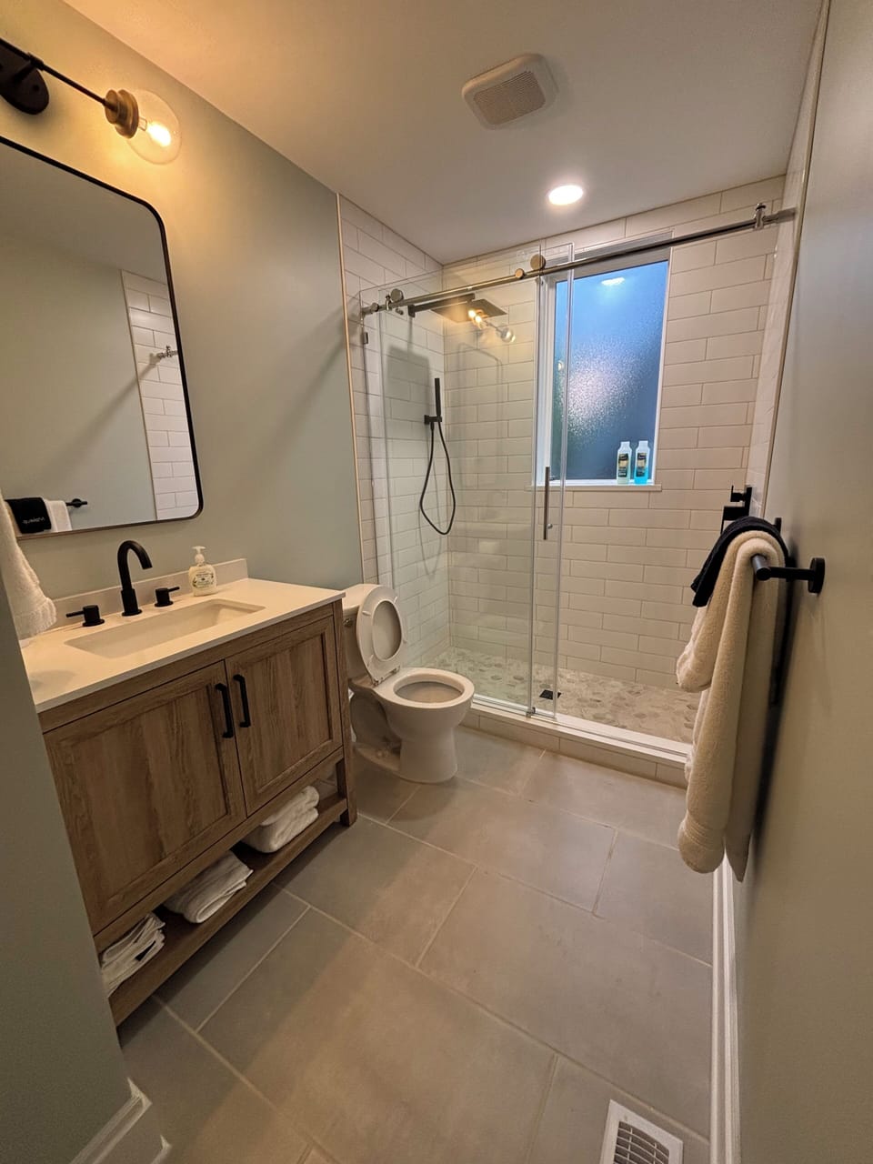 Your bathroom offers a sleek design with spa-like shower comfort