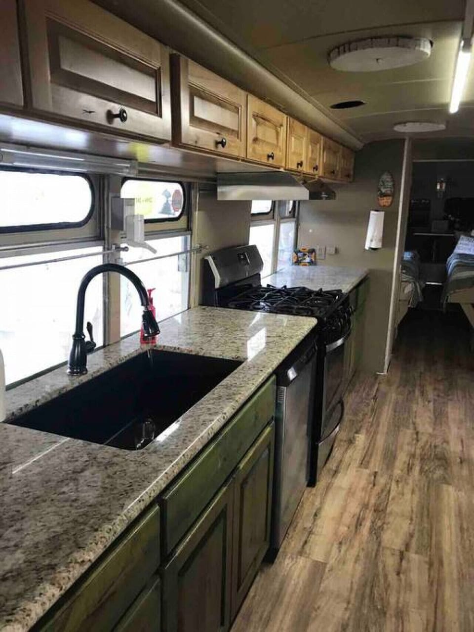 Sunk in sink with granite counter tops.
