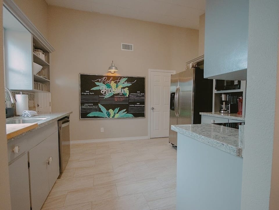 Fully equipped kitchen: pots, pans, kitchen gadgets, & dishwasher.  