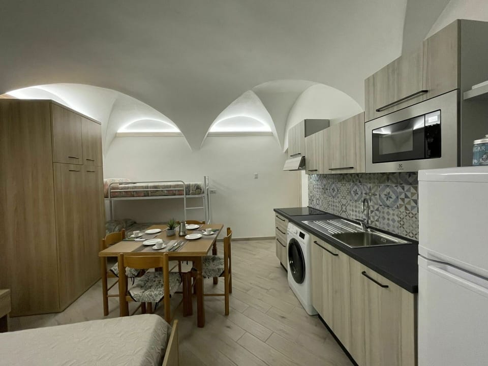 Water, Sky, Building, Azure, Mountain, Tree, Architecture, Body Of Water, Lake, Neighbourhood