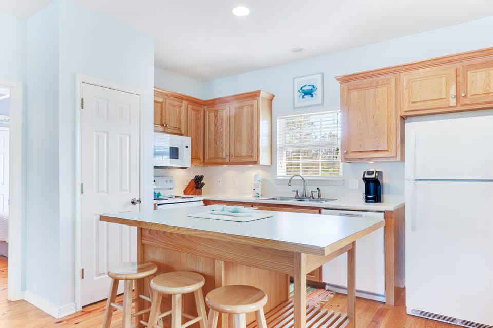 Custom built island adds counter space and company while cooking!